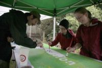 Brian, Ian and Emily prepare a batik banner